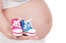 Pregnant Woman With Baby S Bootees Royalty Free Stock Images Pregnant Woman With Baby S Bootees Royalty Free Stock Images