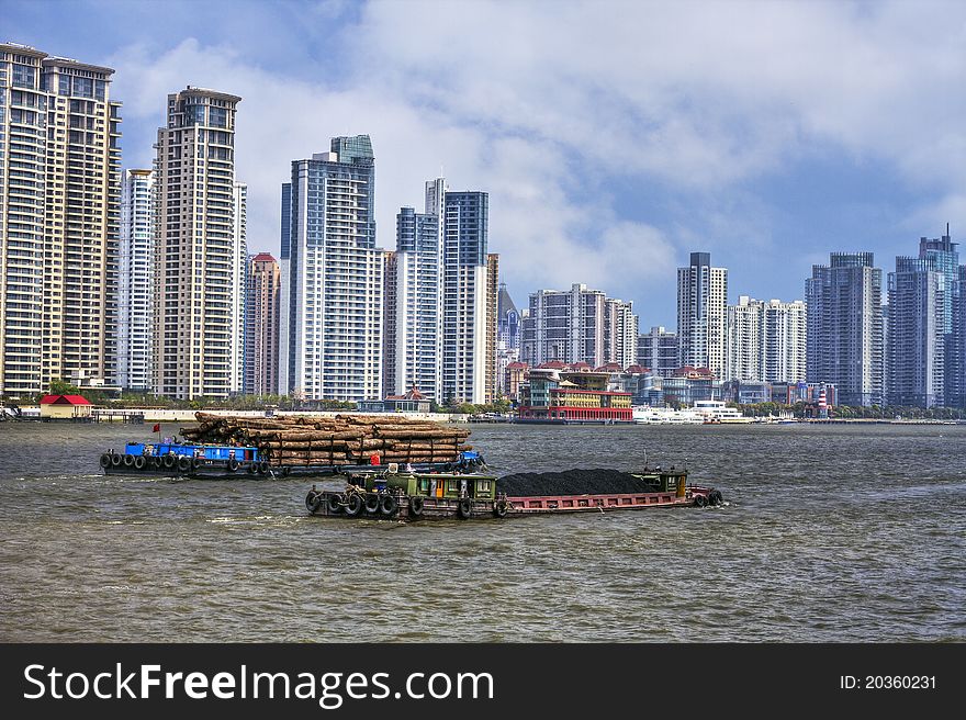 Coal And Timber Barges On The River Huangpu