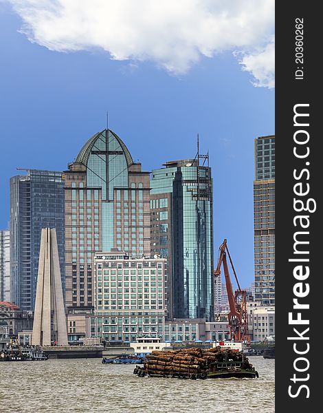 Shanghai - Coal and Timber Barges on the River Huangpu with Modern Buildings in the Background