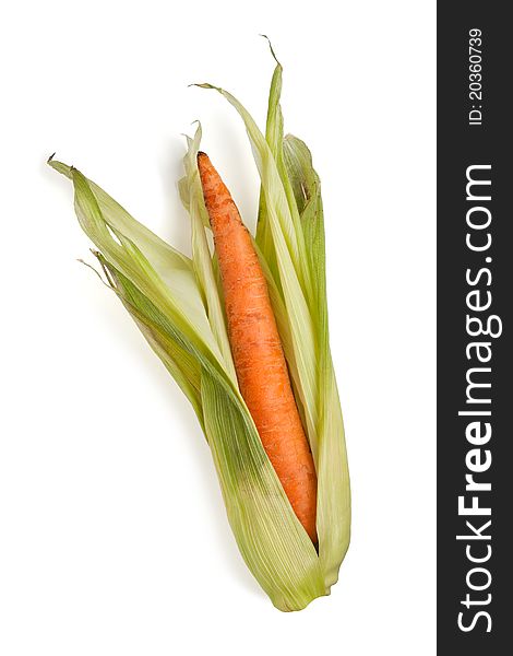 Carrot in a corn wrap isolated on white. Carrot in a corn wrap isolated on white