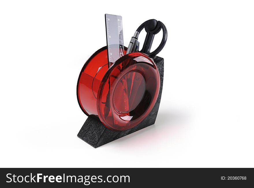 Black and red plastic desk organizer with office tools