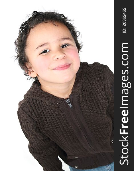 Cute little boy smiling on a white background