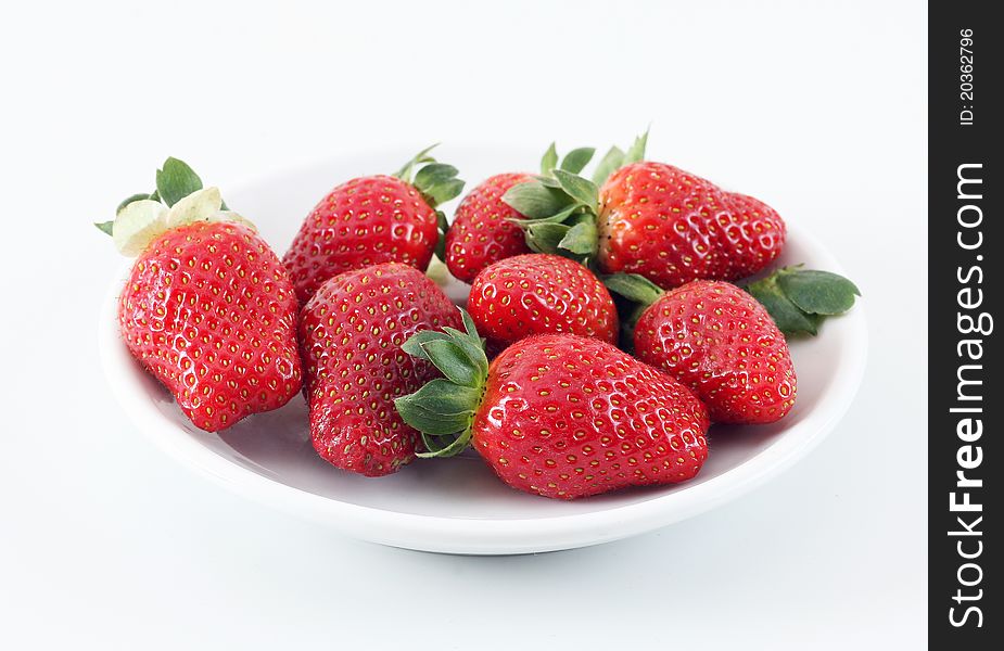 Group of strawberry on white plate