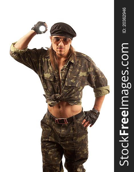 Soldier with flashligh. Studio shot over white background.