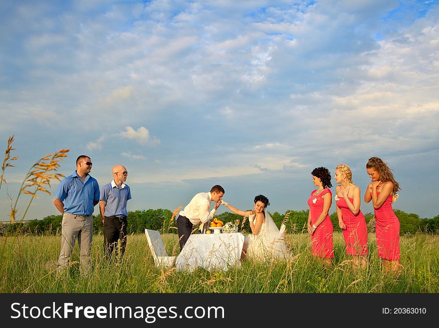 Groom kissing bride`s hand