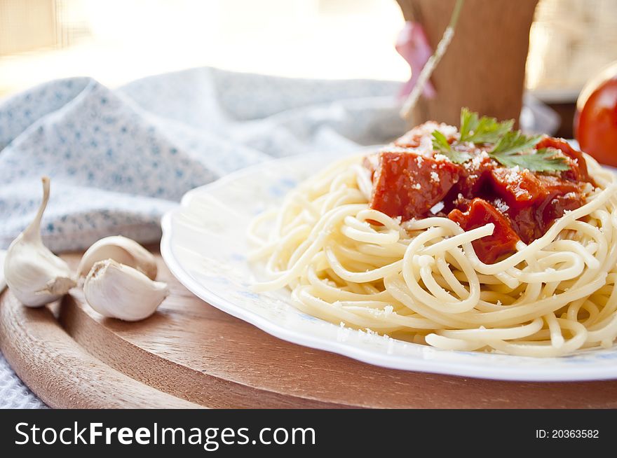 Spaghetti with tomato sauce and ingredients