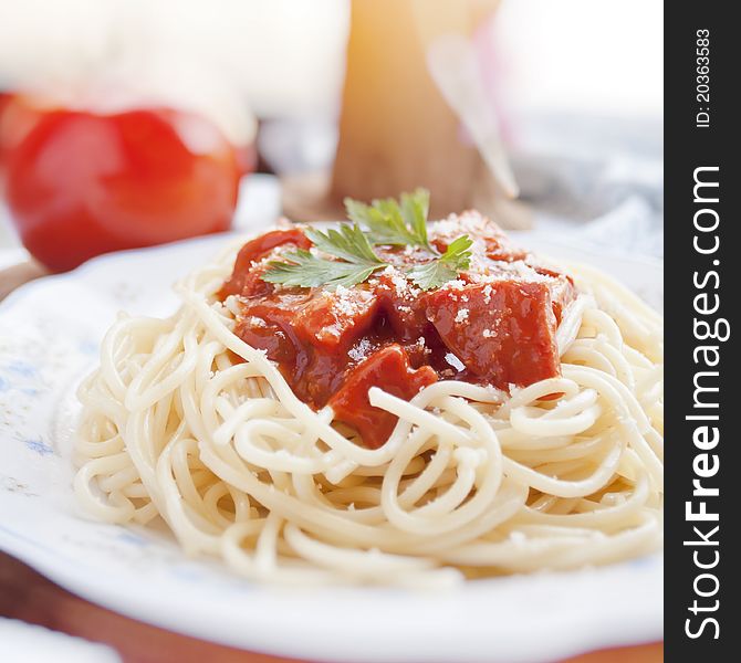 Spaghetti with tomato sauce and ingredients