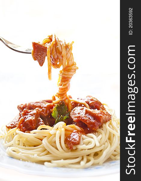 Spaghetti with tomato sauce and ingredients