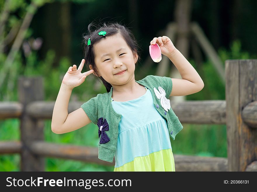 Chinese Girl With Lotus Leaf Hat