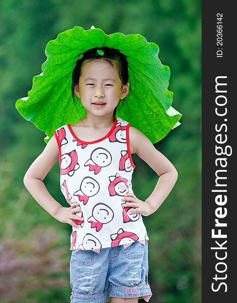 Chinese girl with lotus leaf hat,wuxi ,china