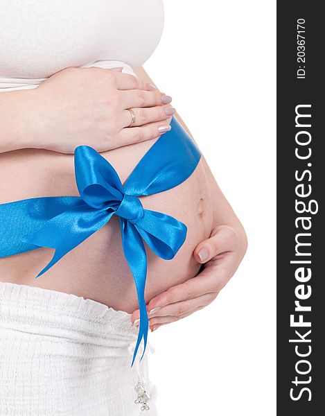 Pregnant belly with blue ribbon