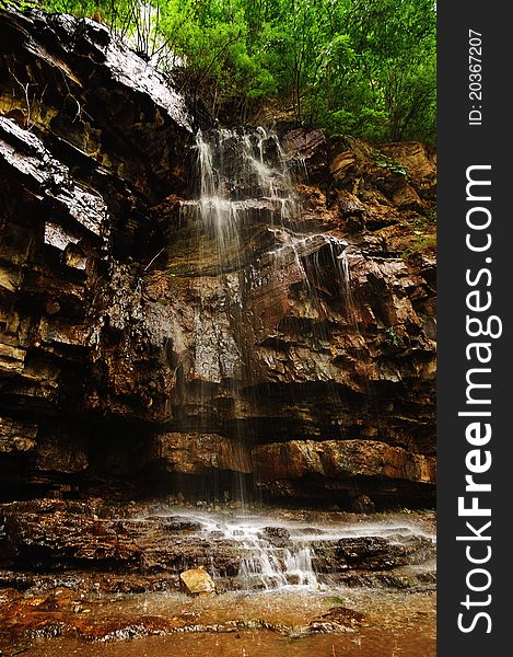 Small Vertical waterfall as Scenic spots in the south of China in summer. Small Vertical waterfall as Scenic spots in the south of China in summer.