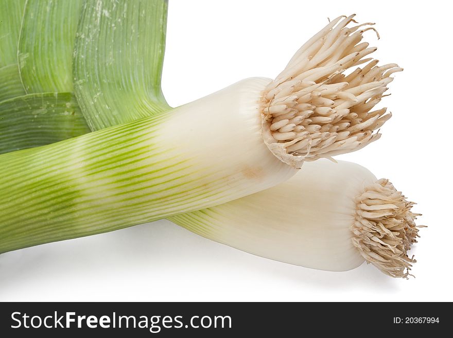 Two leeks isolated on white