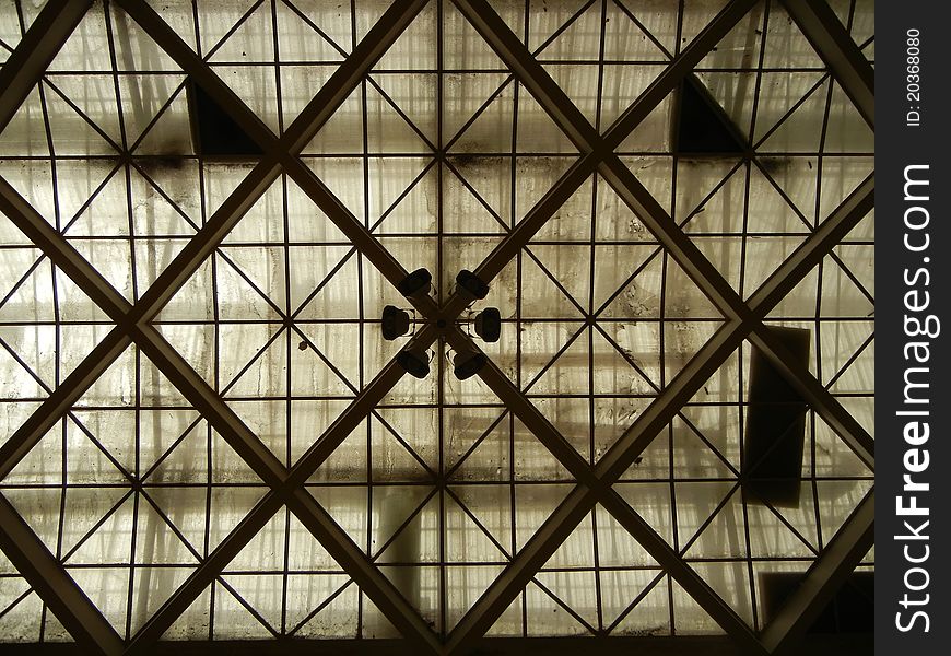 Sports hall roofs construction from interior made of concrete glass and steel. Sports hall roofs construction from interior made of concrete glass and steel