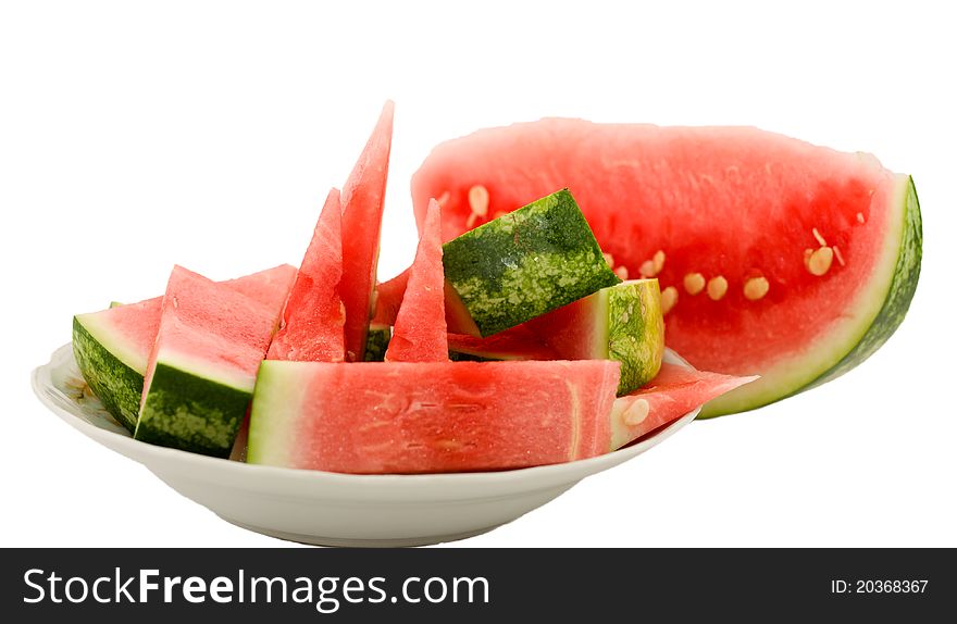 Sliced watermelon - top shot isolate in white backround. Sliced watermelon - top shot isolate in white backround