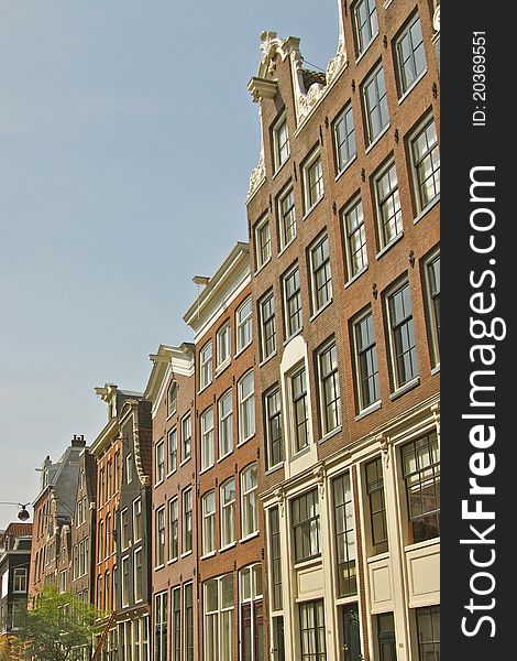 A view of historical Amsterdam buildings in spring. A view of historical Amsterdam buildings in spring