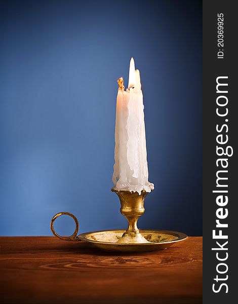 Copy Space Candle On Blue Background