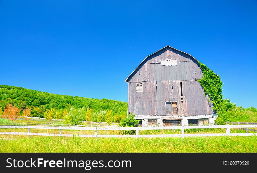 Old dilapidated barn in the suburbs. Old dilapidated barn in the suburbs