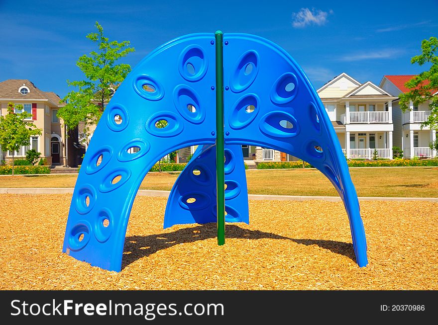 Colorful playground equipment in the neighborhood.