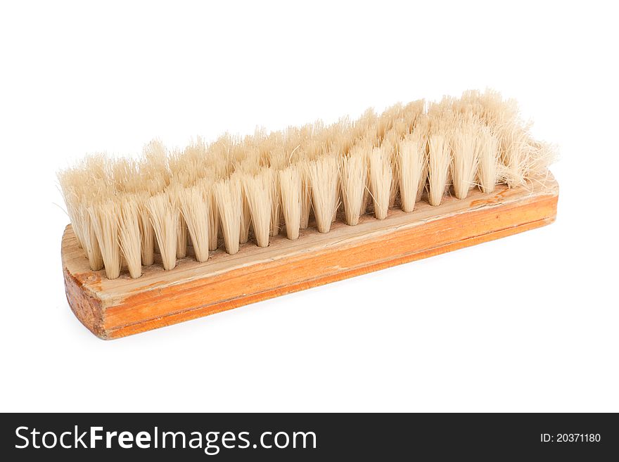 Brown wooden brush isolated on white background.