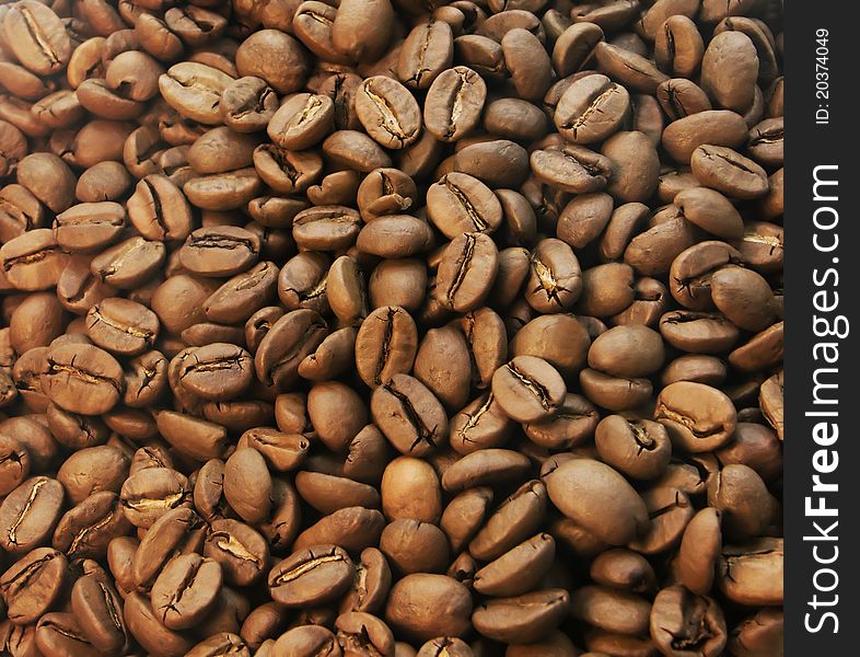Roasted coffee beans closeup full frame