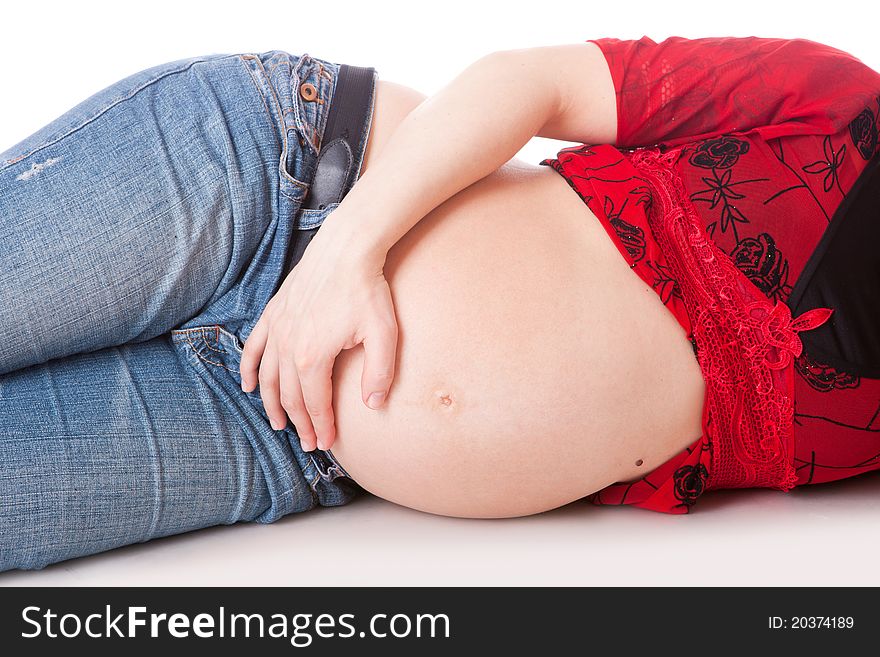 Image of pregnant woman with her hands on her belly