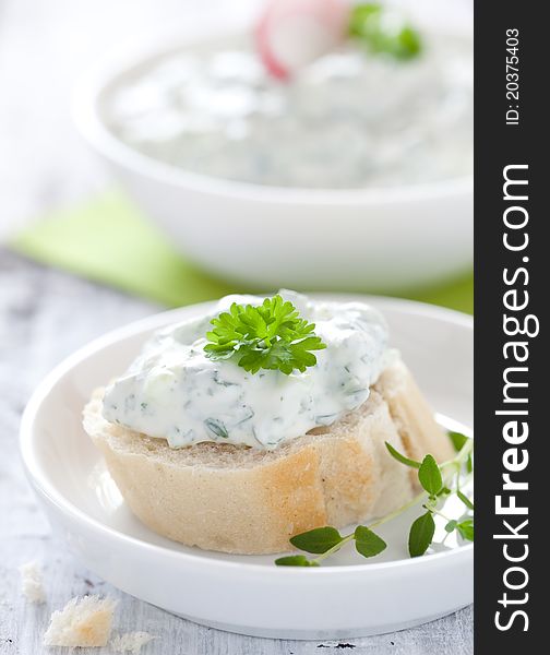 Baguette with fresh herb cheese. Baguette with fresh herb cheese