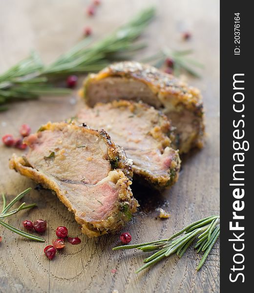 Juicy lamb fillet with  fresh rosemary and peppercorns. Selective focus