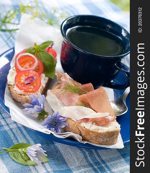 Healthy sandwich made with  bread, tomato  and ham slices. Selective focus. Healthy sandwich made with  bread, tomato  and ham slices. Selective focus