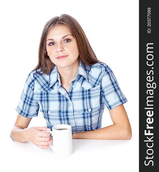 A smiling girl is drinking a coffee from a white cup. isolated on white background