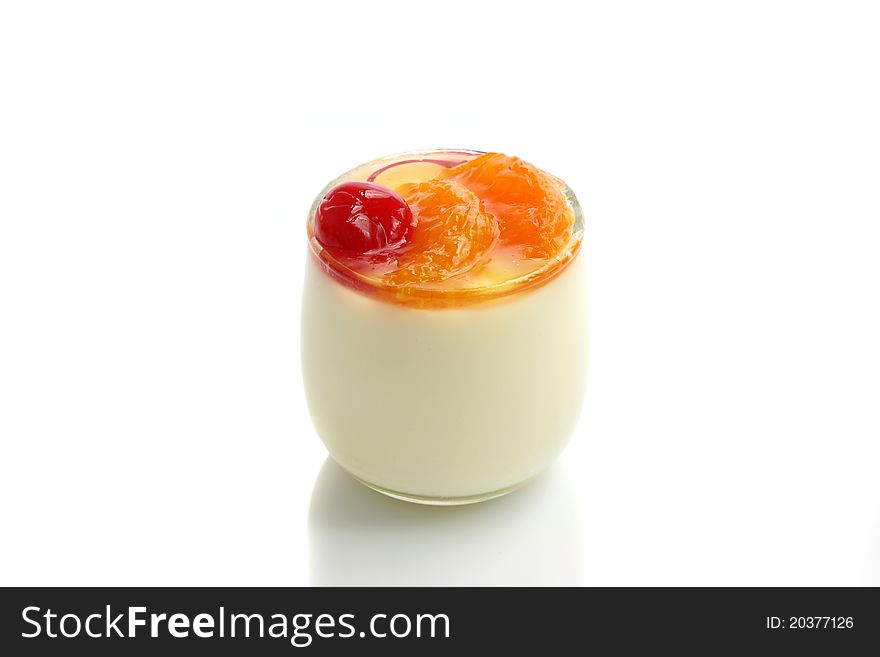 Fruit dessert with cherry and orange isolated in white background