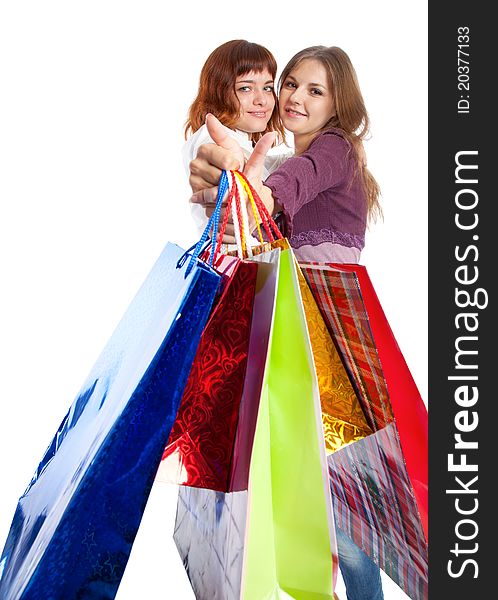 Two teen girls with bags. Isolated on white background