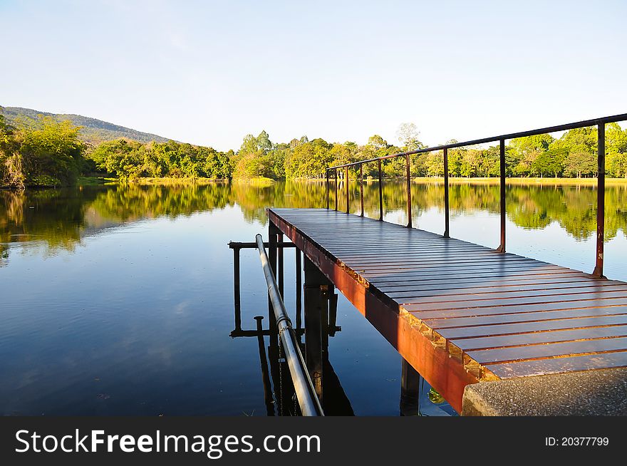 Sunset Reflection on the Arngkaew Reservoir Lake in Chiangmai, Thailand