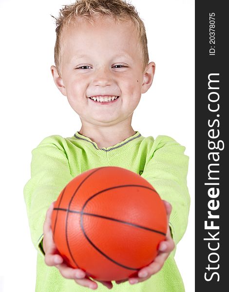 Happy boy showing basketball - isolated over white background