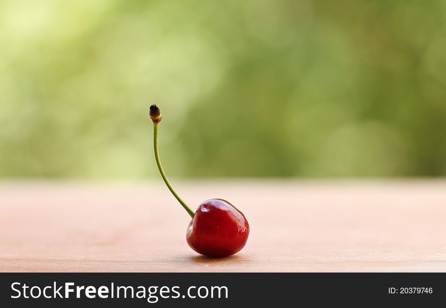 Ripe cherry on the kitchen board