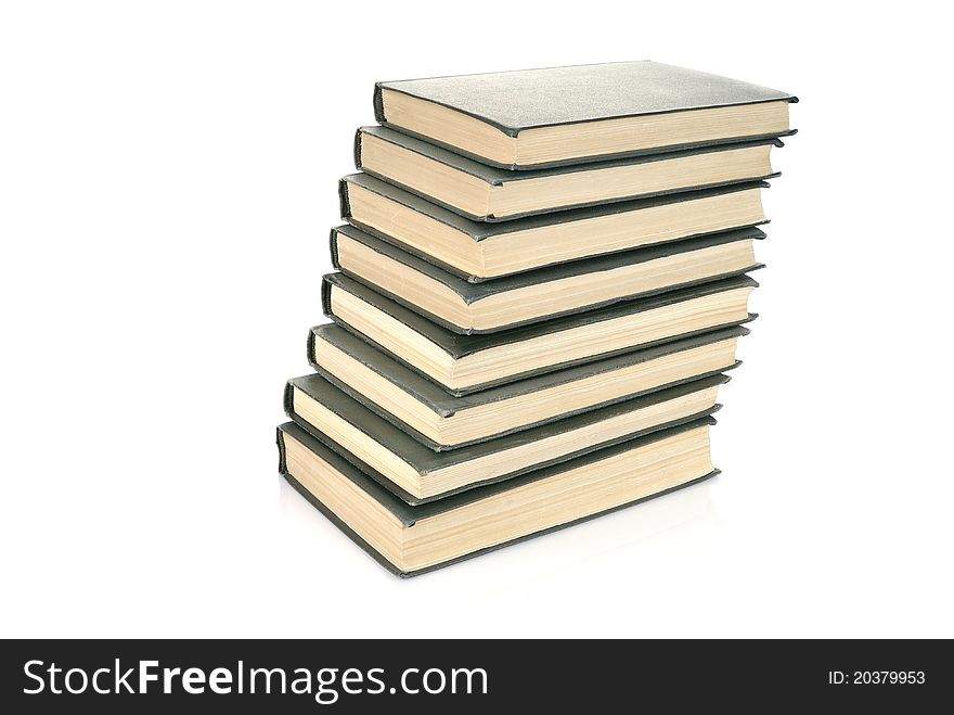 Old books stack isolated on white