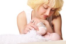 Young Mother Feeds Her Baby Royalty Free Stock Photos Young Mother Feeds Her Baby Royalty Free Stock Photos