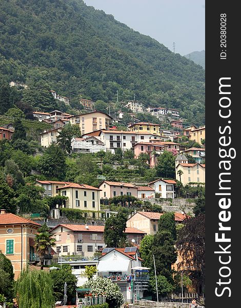 Small collection of colourful houses on the side of a mountain in Italy. Small collection of colourful houses on the side of a mountain in Italy