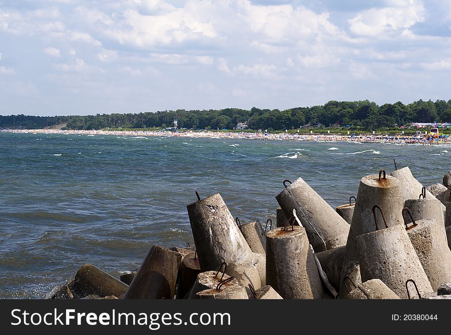 Big breakwater on the sea