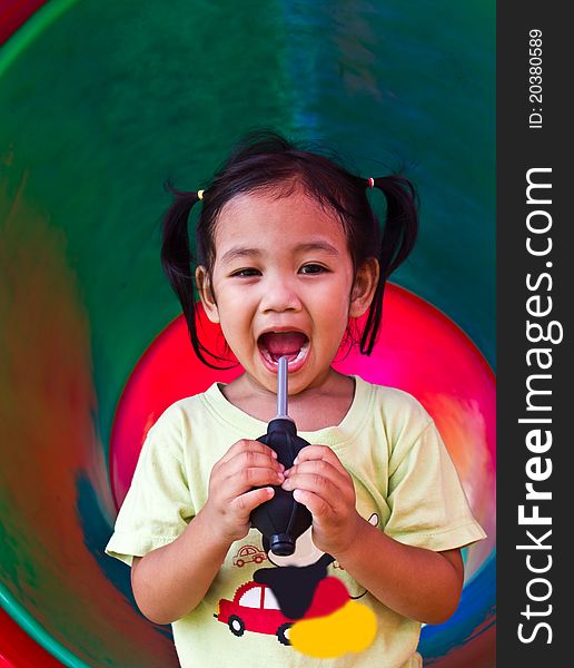Children squeezed inflatable in colorful tunnel of the playgroun. Children squeezed inflatable in colorful tunnel of the playgroun