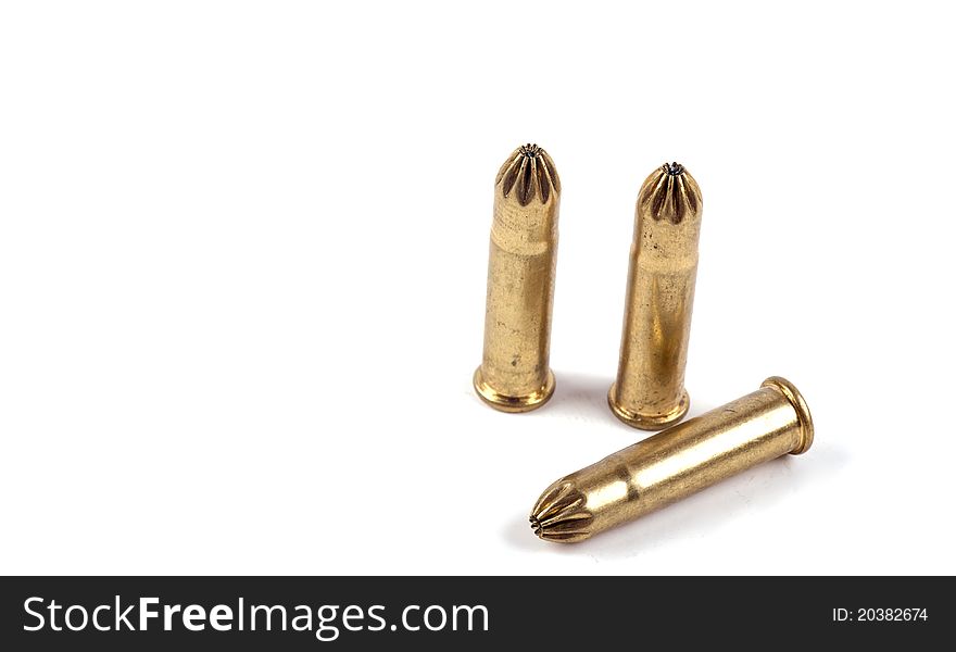 Studio shot of several 9mm hollow point bullets on white background. Studio shot of several 9mm hollow point bullets on white background