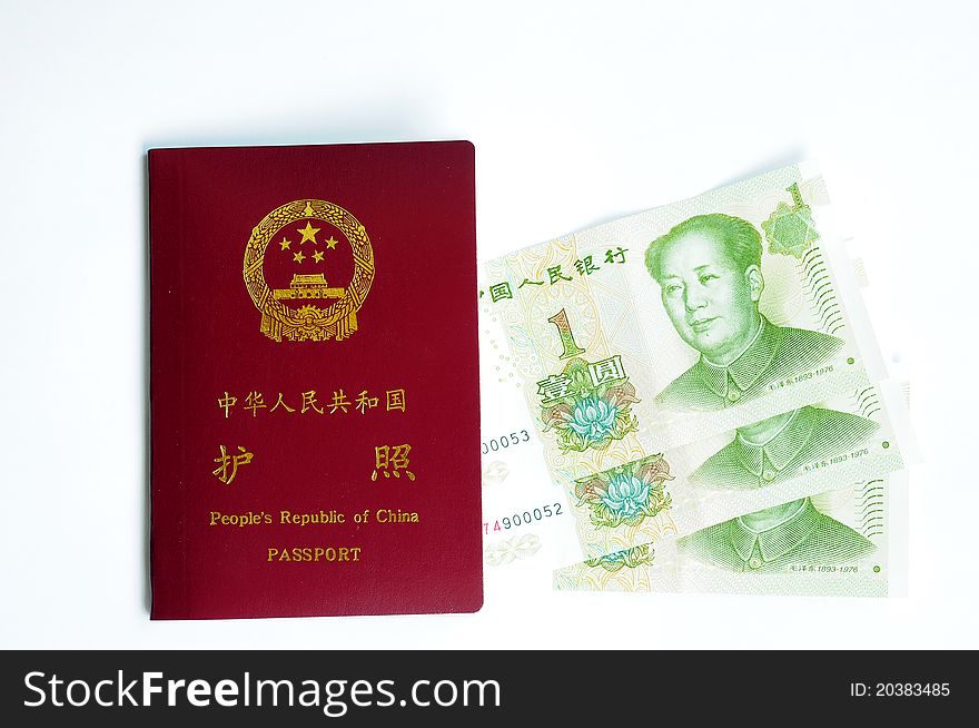 Closeup view of China passport and Chinese currency notes. Closeup view of China passport and Chinese currency notes