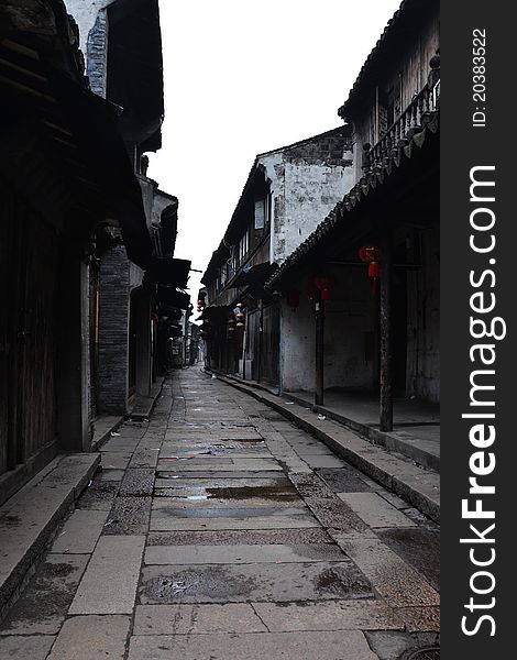 An Empty street between old house in Chinese water town in early morning