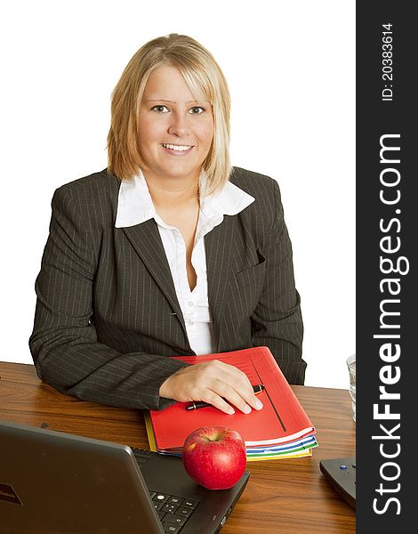 Young woman  in office workplace- on white background. Young woman  in office workplace- on white background