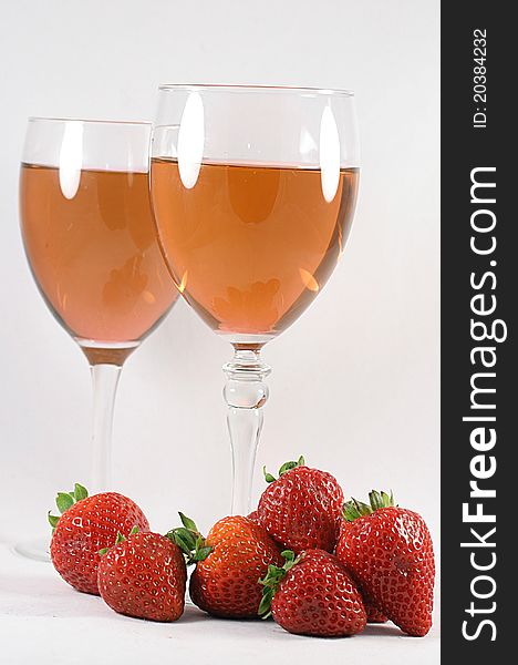 Pink wine and fresh strawberries. Pink wine and fresh strawberries.