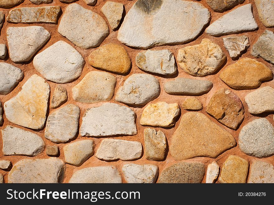 Beautiful old fashioned stone wall made from large rocks. Beautiful old fashioned stone wall made from large rocks