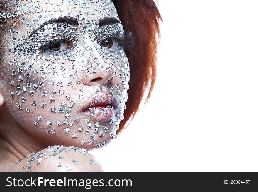 Beauty woman in futuristic makeup isolated over white background
