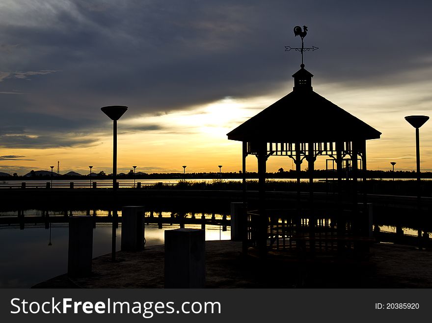 Pavilion during sunset on lake shore