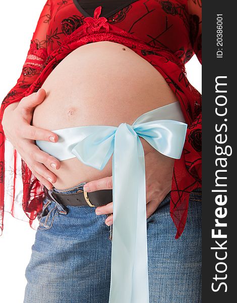 A belly of pregnant woman isolated on a white background