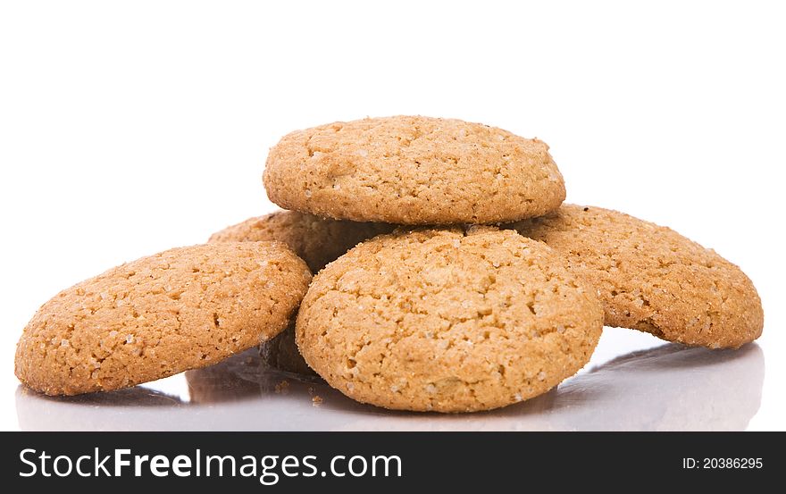 Fresh tasty cookies against a white background